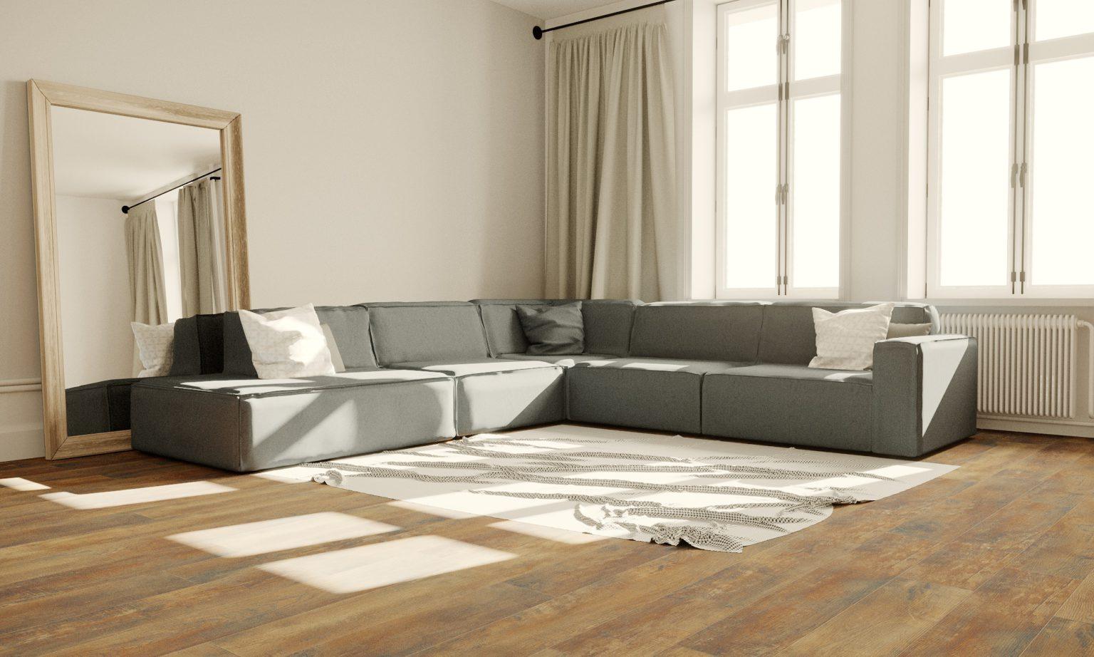 "Stijlvolle grijze U-vormige hoekbank in een ruime, lichte woonkamer met houten vloer, grote spiegel en elegante witte gordijnen."